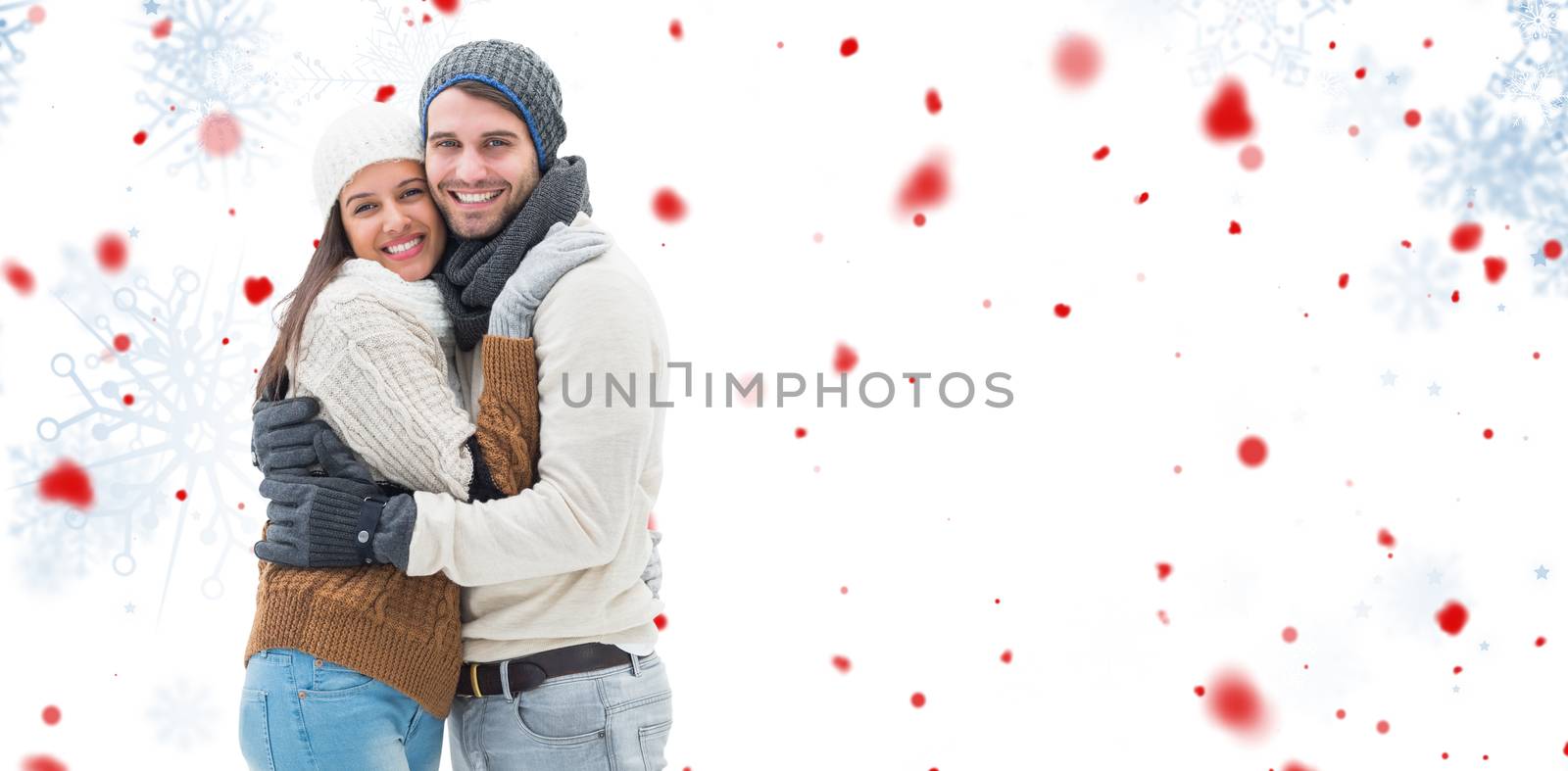 Composite image of young winter couple by Wavebreakmedia
