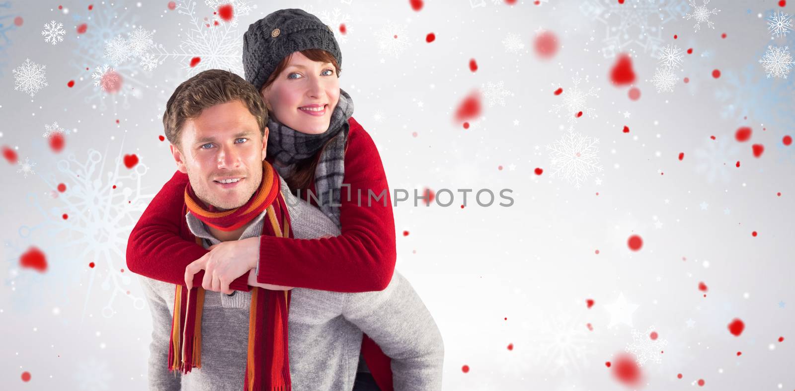 Composite image of man giving girlfriend piggy back by Wavebreakmedia