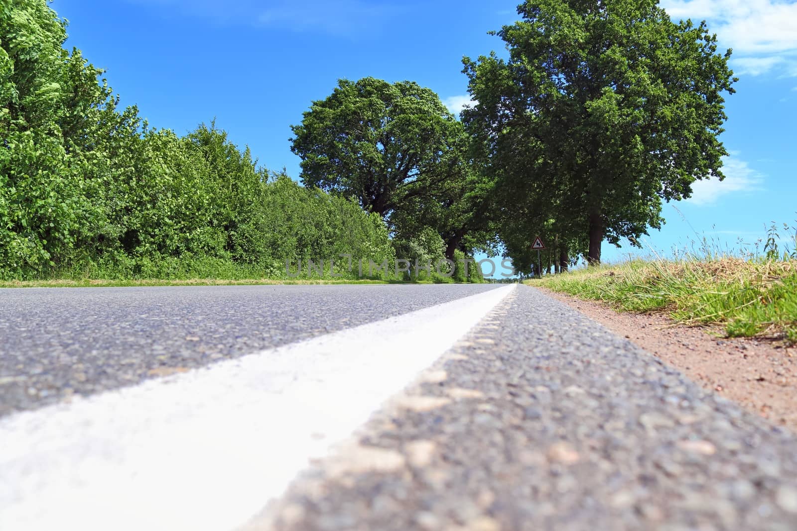 Beautiful view on countryside roads with fields and trees in nor by MP_foto71