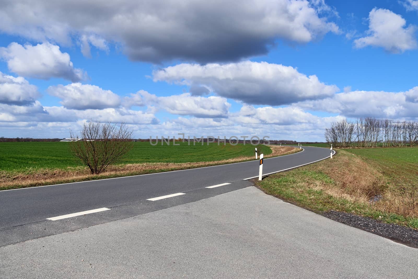 Beautiful view on countryside roads with fields and trees in nor by MP_foto71