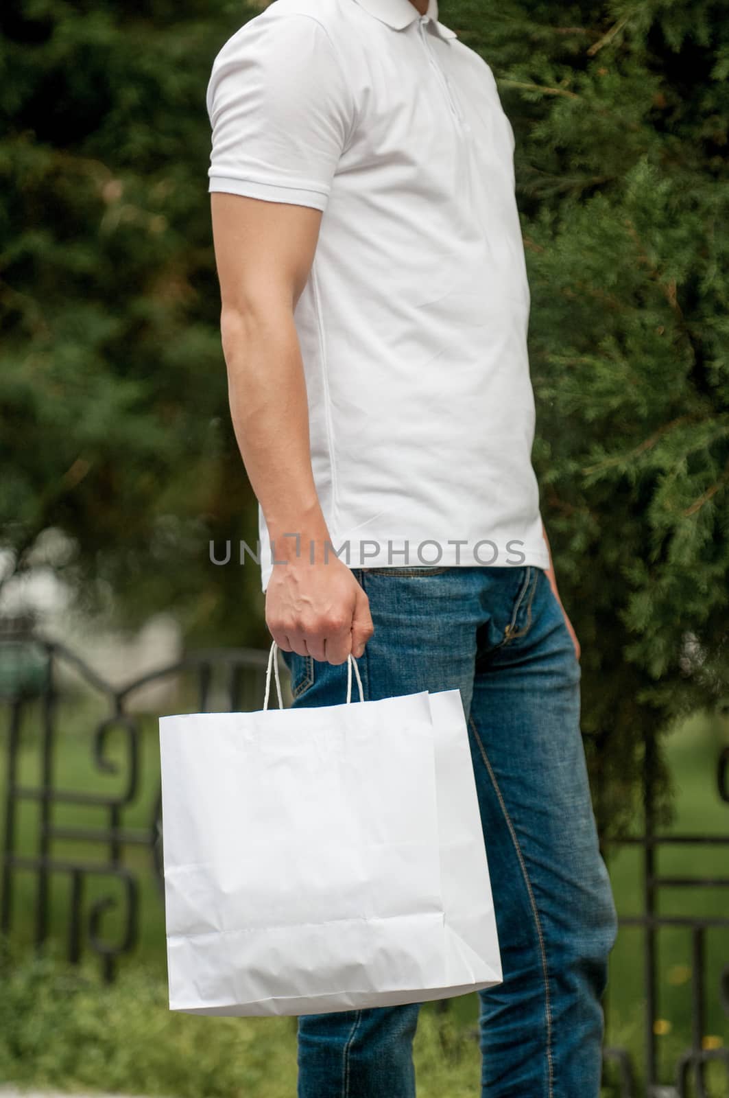 man with a white package in his hands by A_Karim