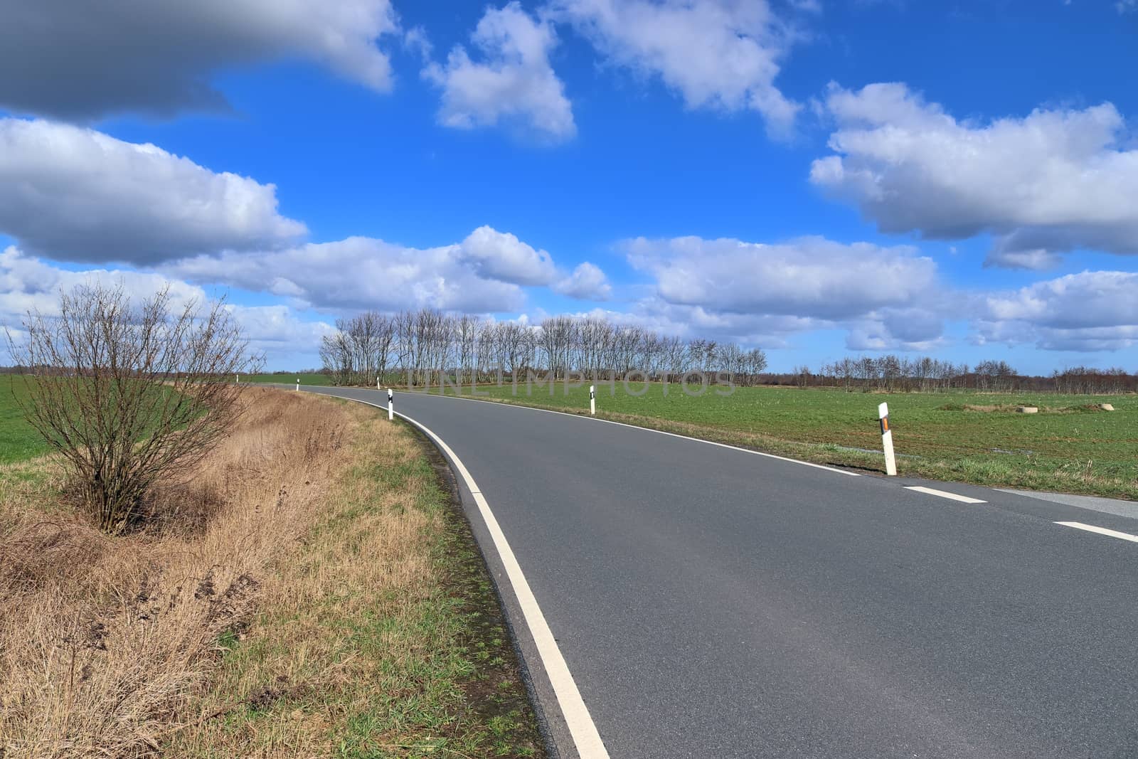 Beautiful view on countryside roads with fields and trees in nor by MP_foto71