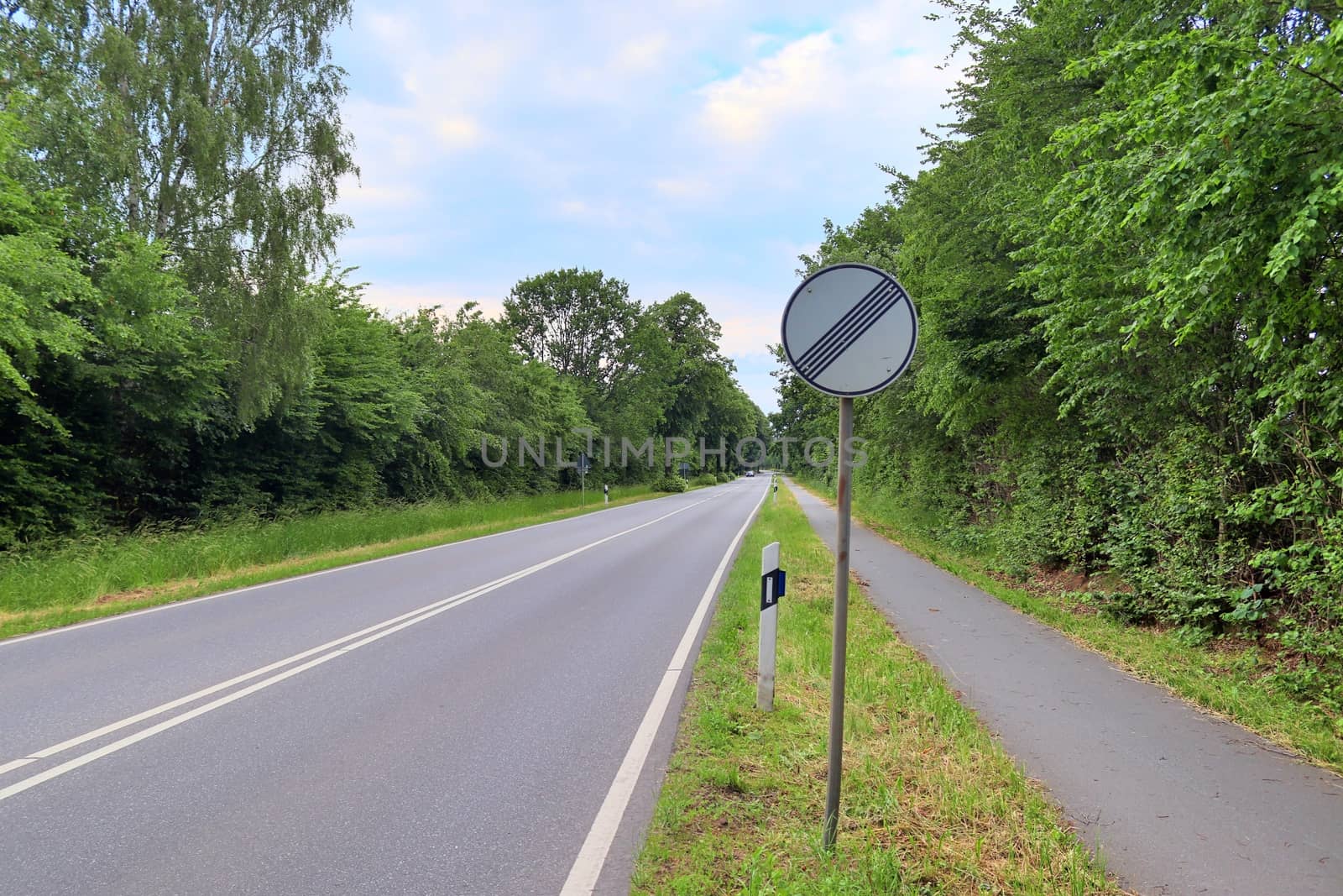 Beautiful view on countryside roads with fields and trees in northern europe.