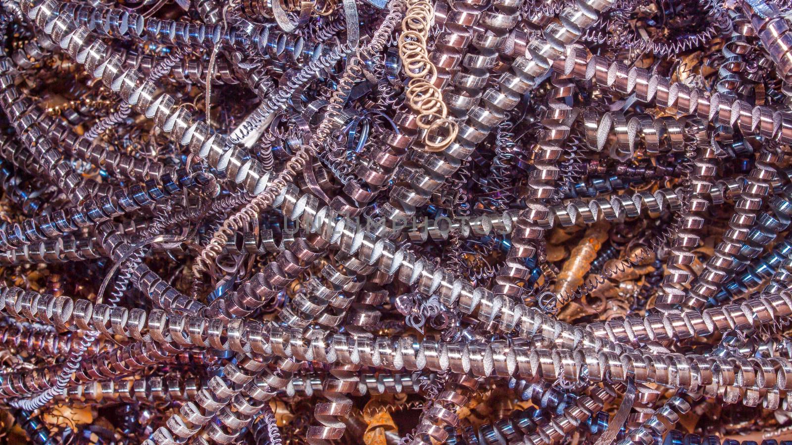 Abstract color background of metal shavings. Processing of ferro by YevgeniySam