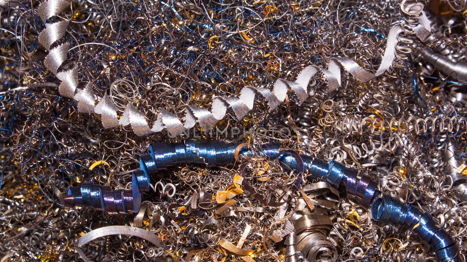 Abstract color background of metal shavings. Processing of ferro by YevgeniySam