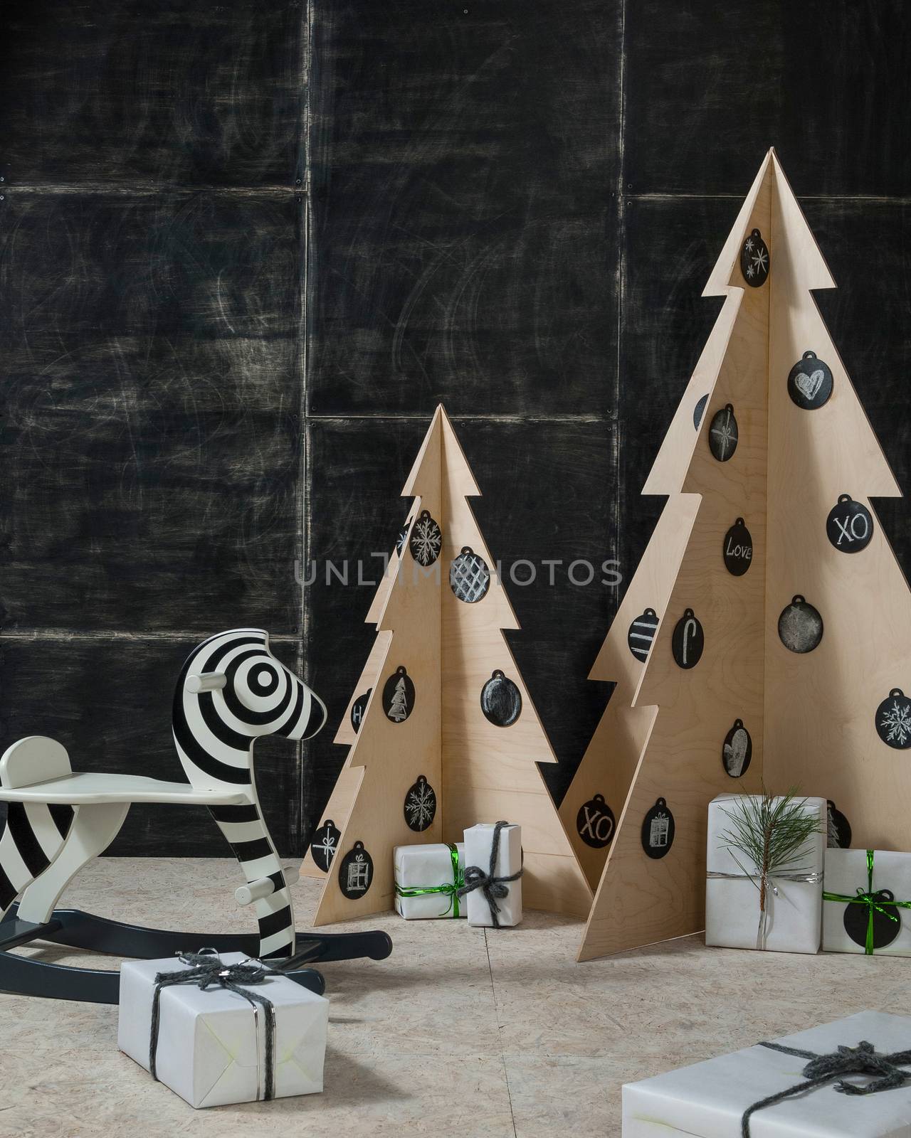 New Year's and Christmas decoration zebra and fir plywood and wood on a dark background
