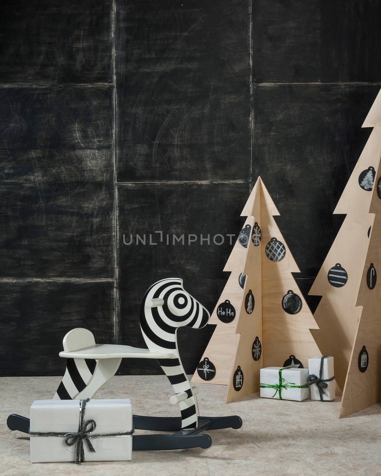 New Year's and Christmas decoration zebra and fir plywood and wood on a dark background