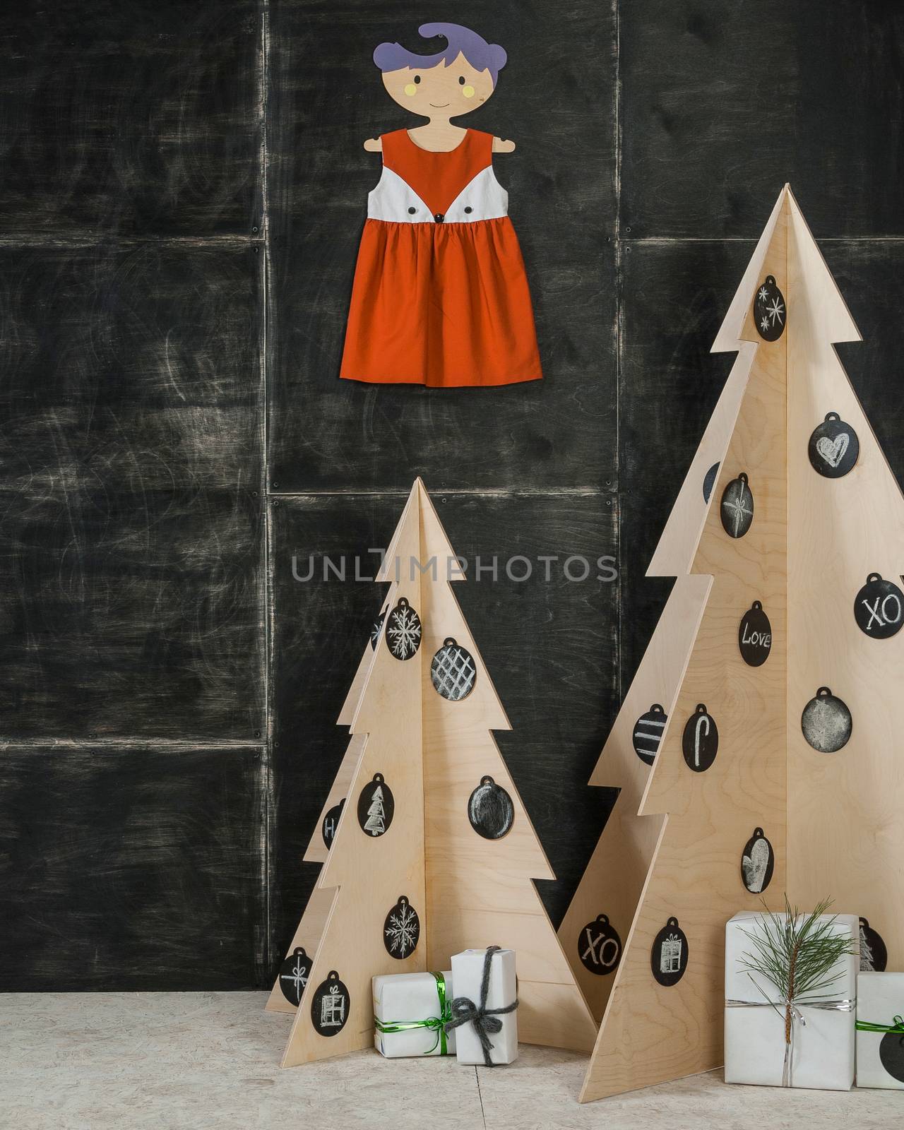 New Year's and Christmas decoration fir boxes made of plywood and wood gifts on a dark background