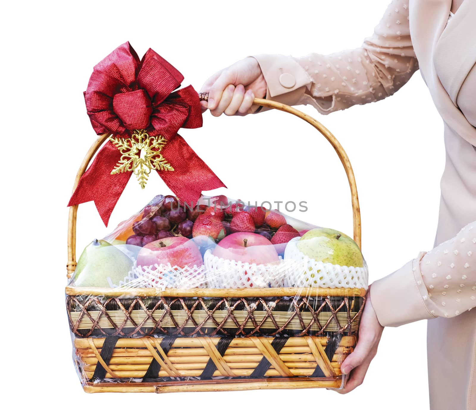 Young woman holding new year fruit gift basket isolated on white background