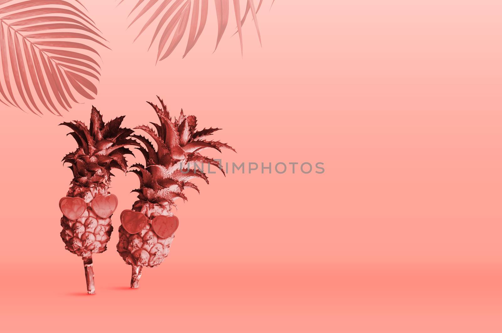 Summer tropical concept design of Pineapple wearing sunglasses on Pantone Color of the Year 2019 Living Coral