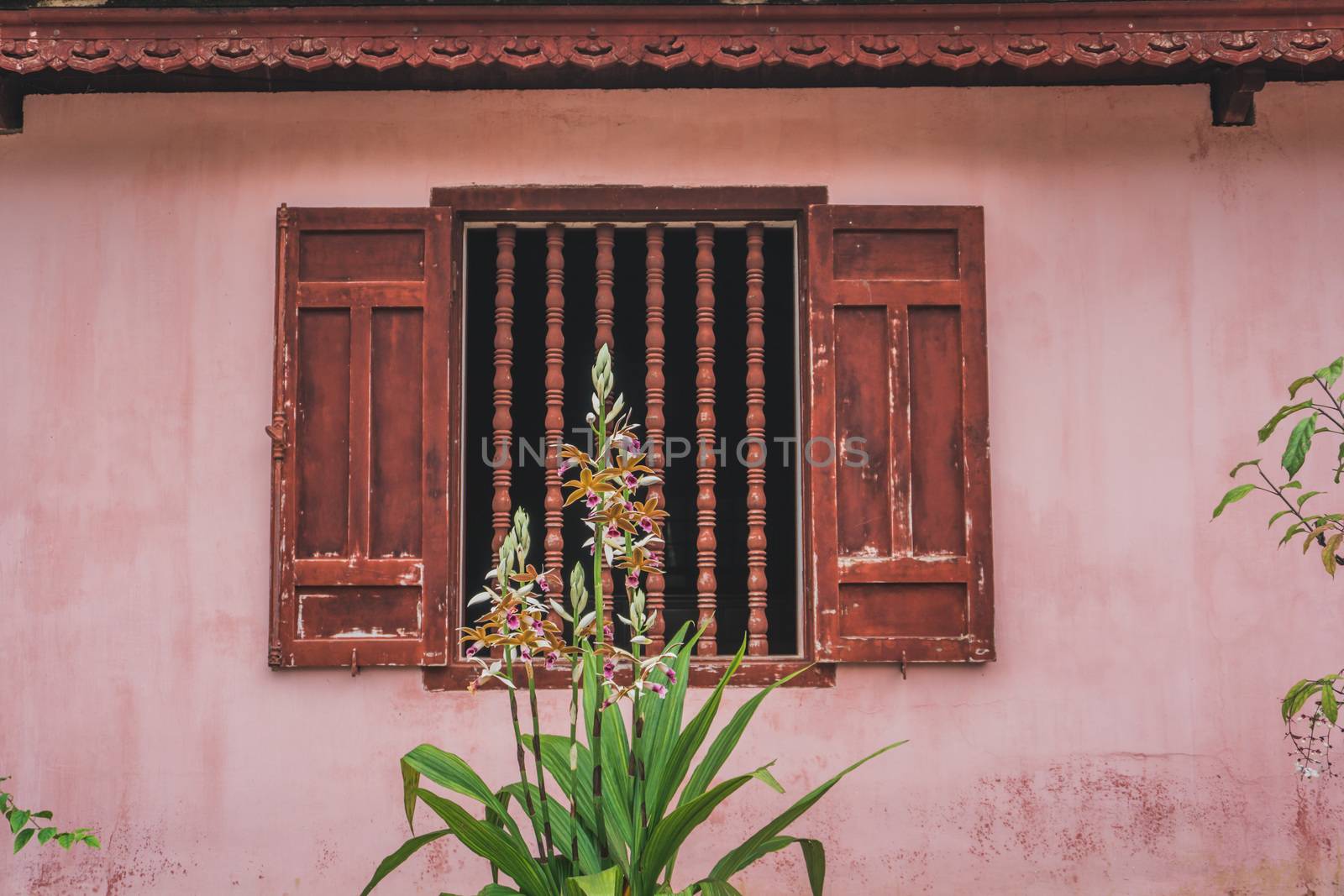 It's a beautiful window. Traditional Vietnamese home. Asia