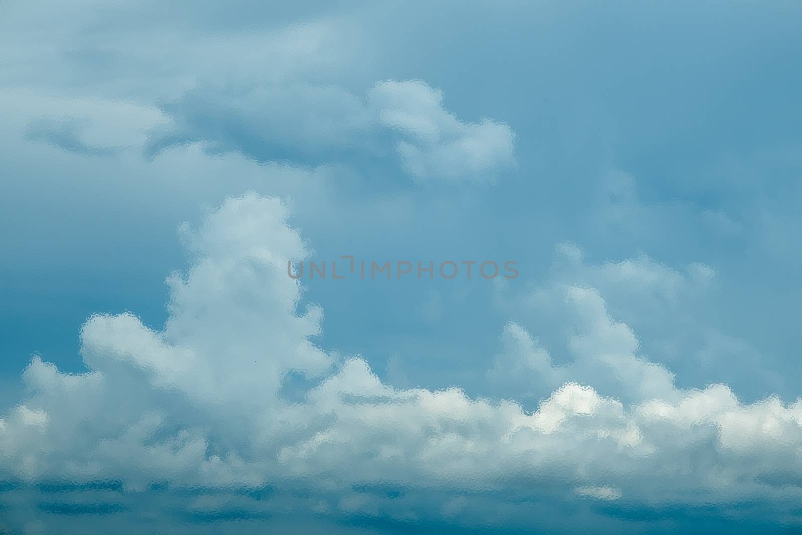 Blue sky with white cloud frosted glass texture as background. by peerapixs