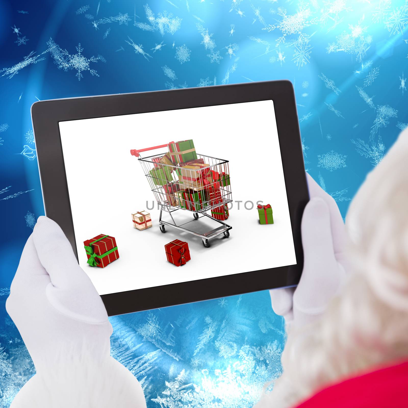 Composite image of santa claus using tablet pc by Wavebreakmedia