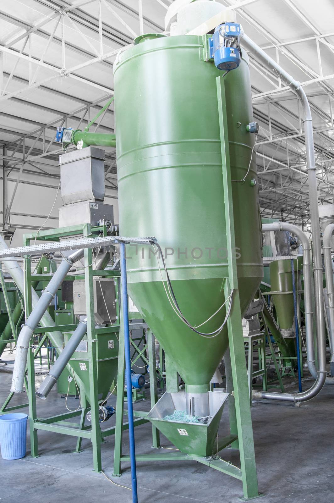 factory equipment for processing and recycling of plastic bottles. PET recycling plant