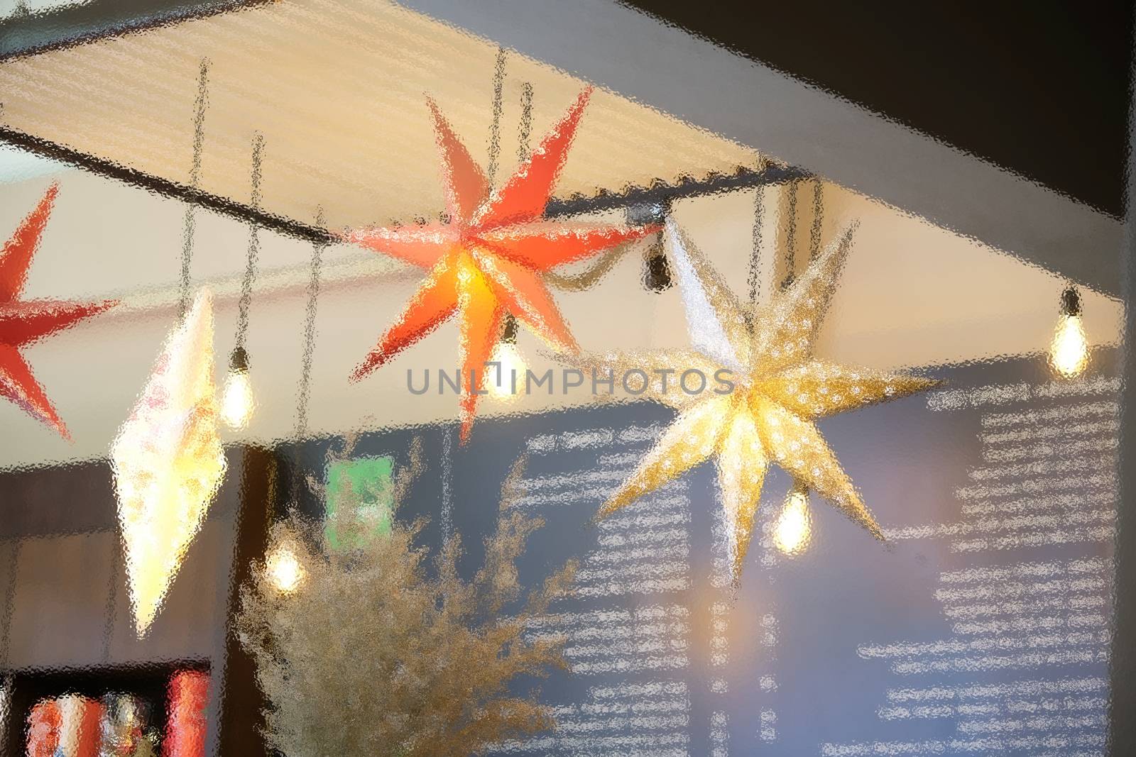The Christmas star through frosted glass image for background use