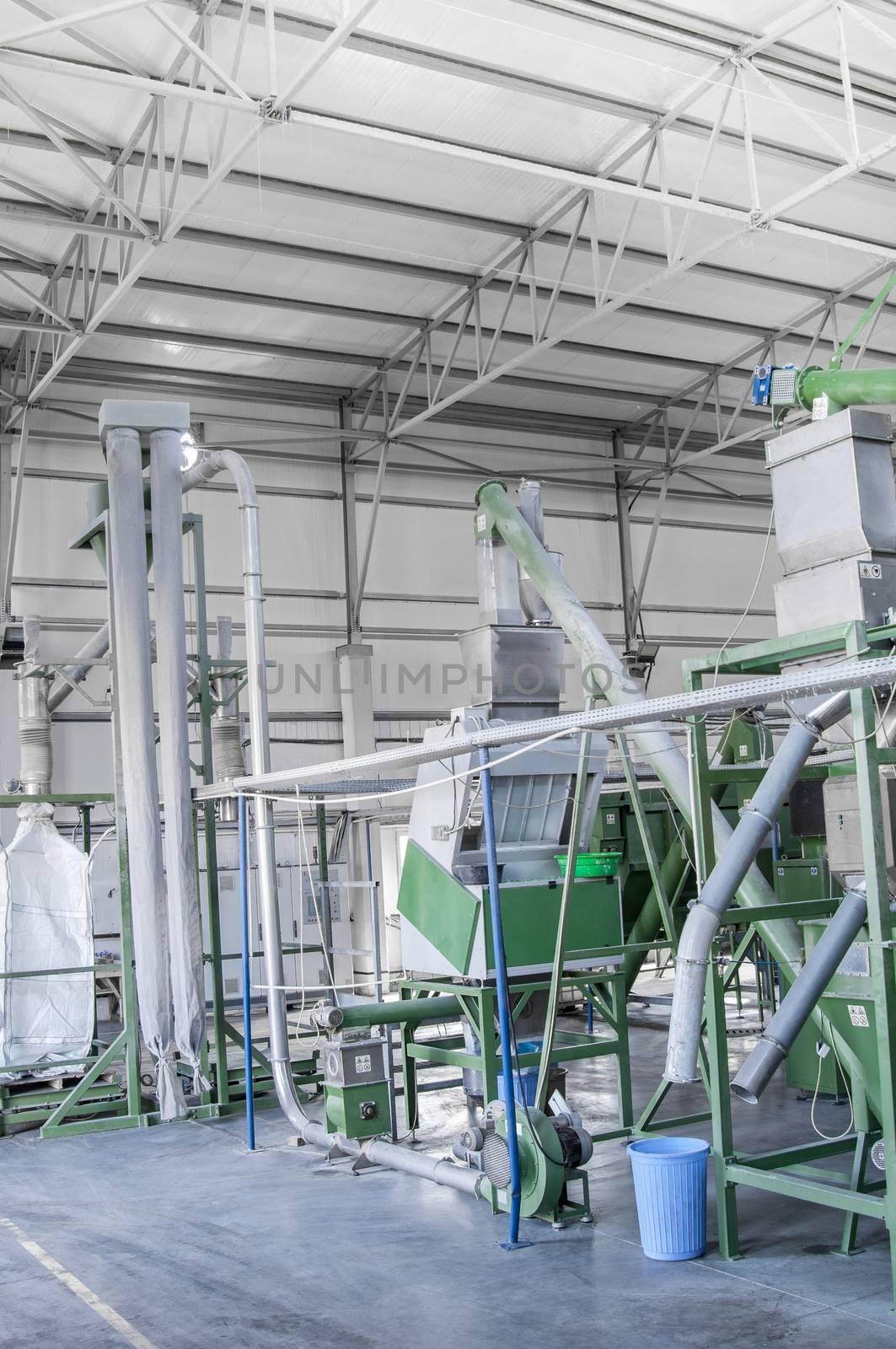 factory equipment for processing and recycling of plastic bottles. PET recycling plant