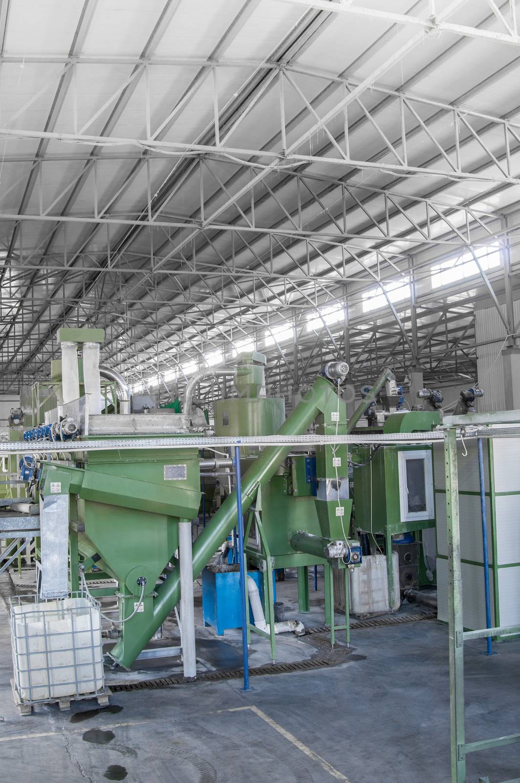 factory equipment for processing and recycling of plastic bottles. PET recycling plant