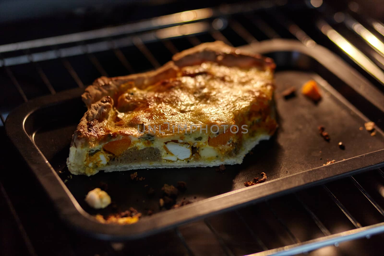 Piece of tart baked in the oven. Small depth of focus.