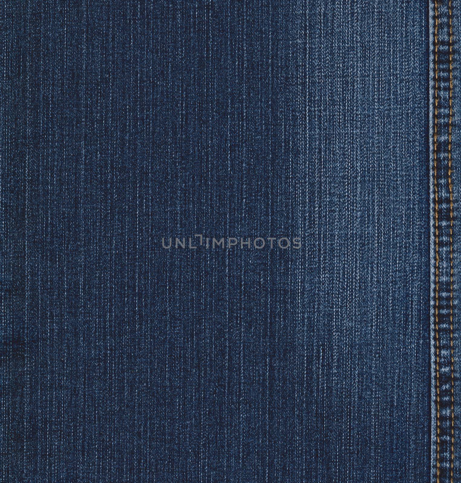 Real blue jeans denim texture, background with stitch