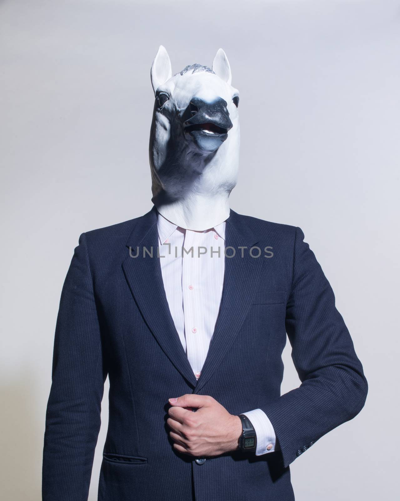 man with a horse mask on a light background by A_Karim