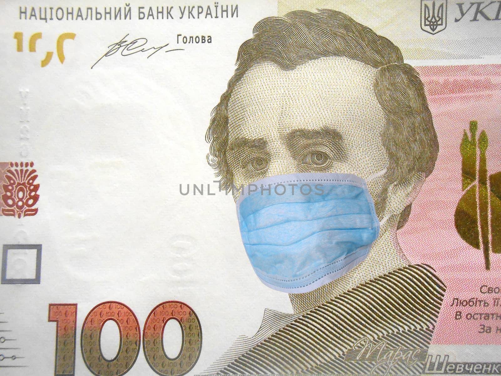 Coronavirus COVID-19 in Ukraine. 100 ukrainian money hryvnia money bill with face mask. World economy hit by corona virus outbreak and pandemic fears. Coronavirus affects global stock market. Finance and crisis concept.