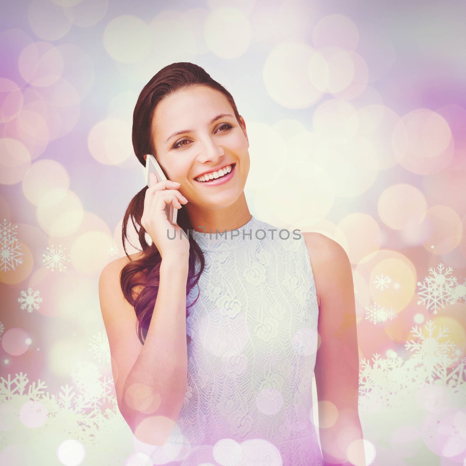 Brunette on the phone against snowflake pattern