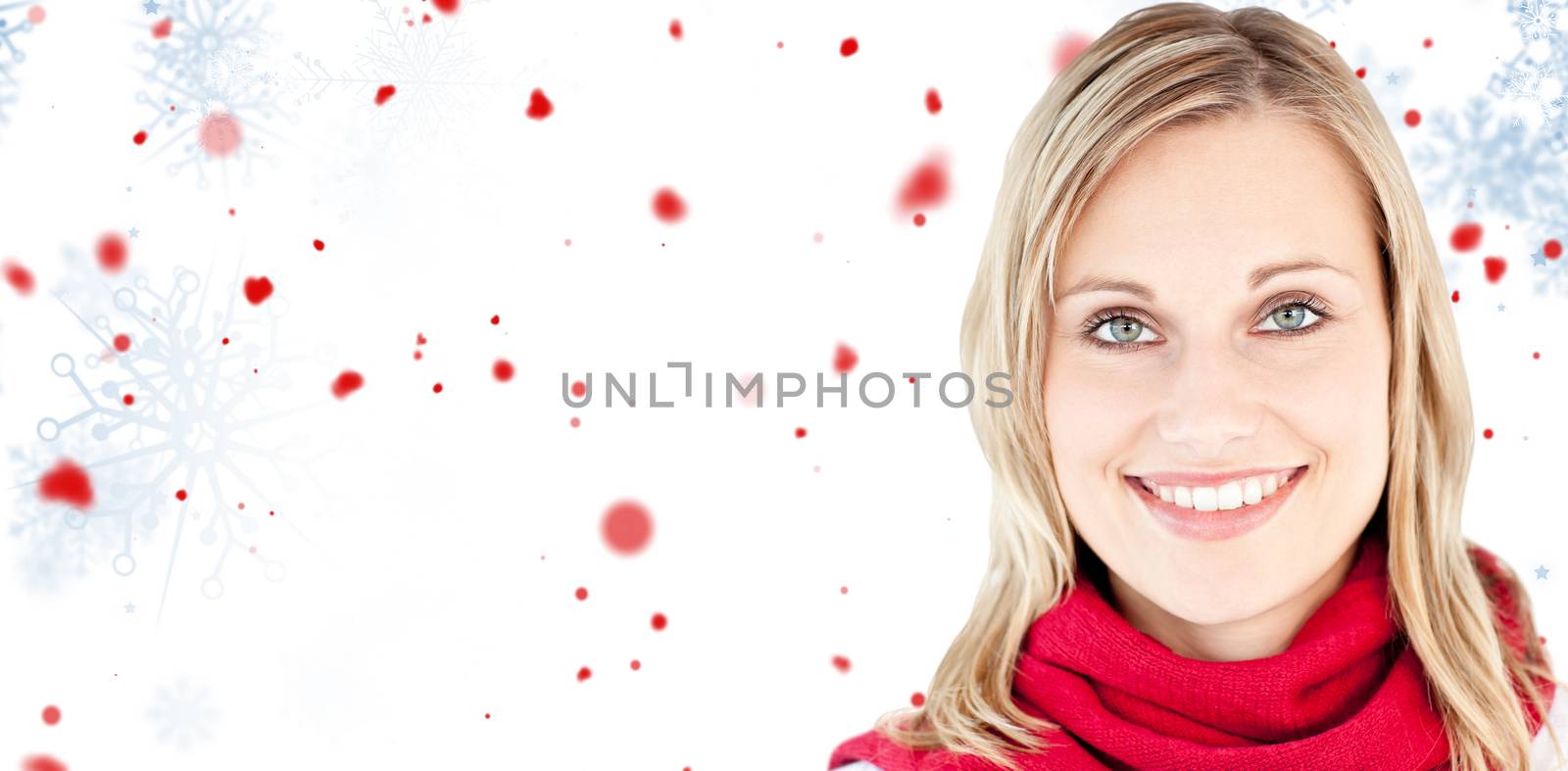 Portrait of a beautiful woman with a red scarf smiling at the camera against snowflake pattern