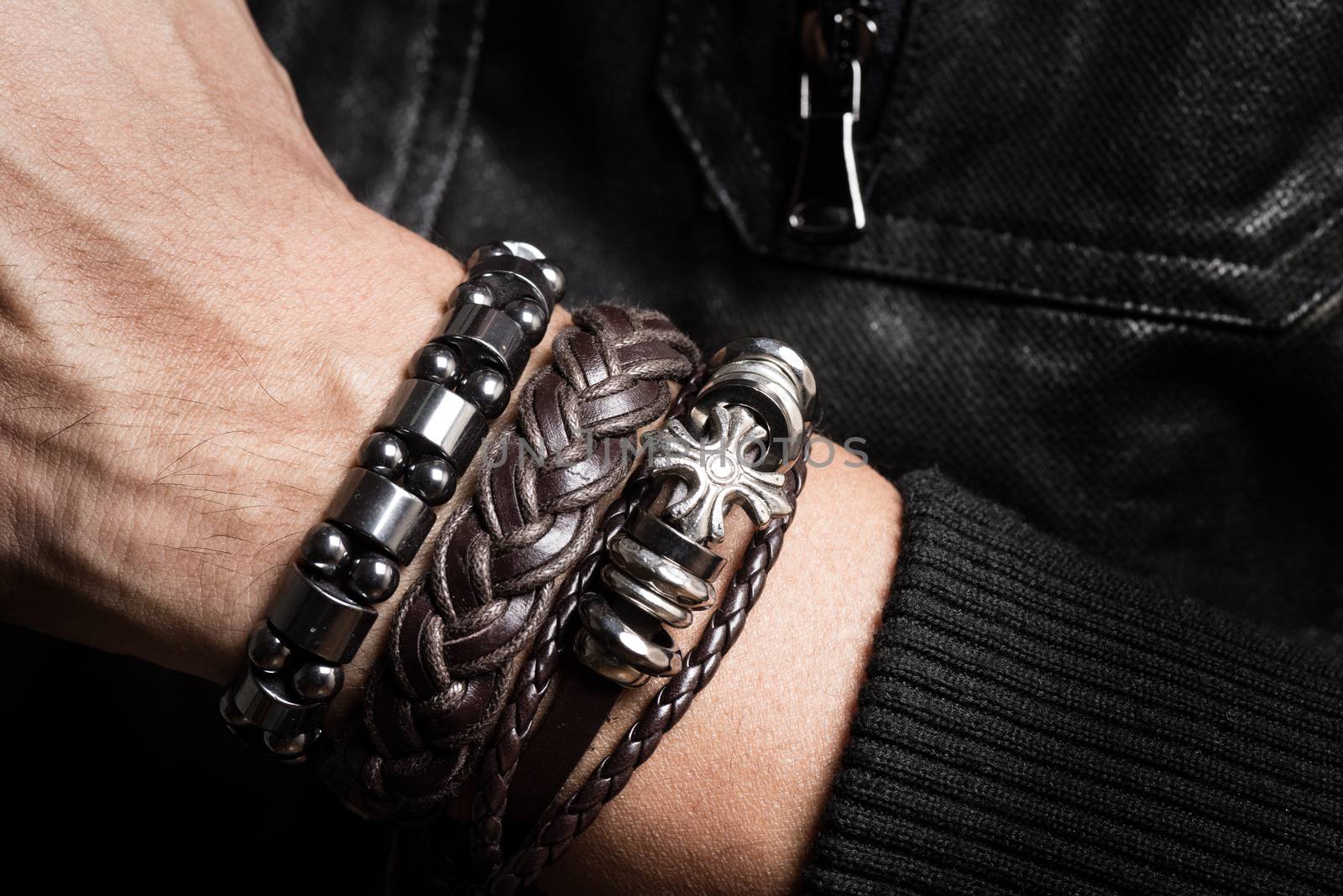 closeup leather bracelet on man's wrist