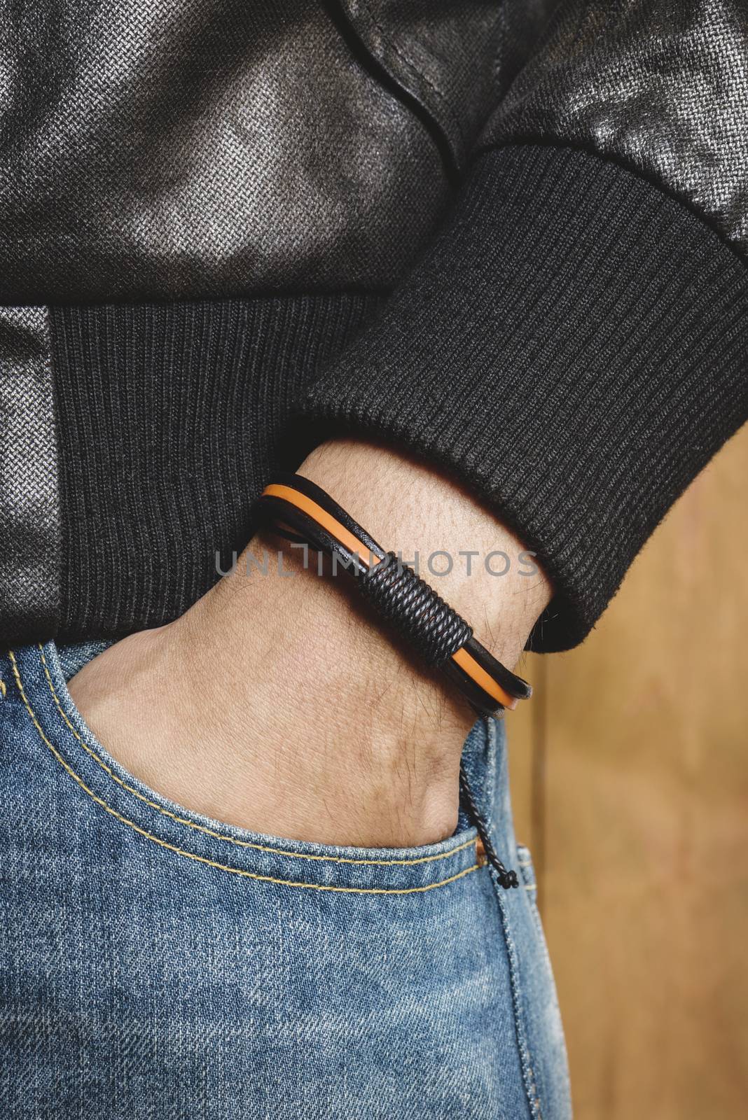 closeup leather bracelet on man's wrist