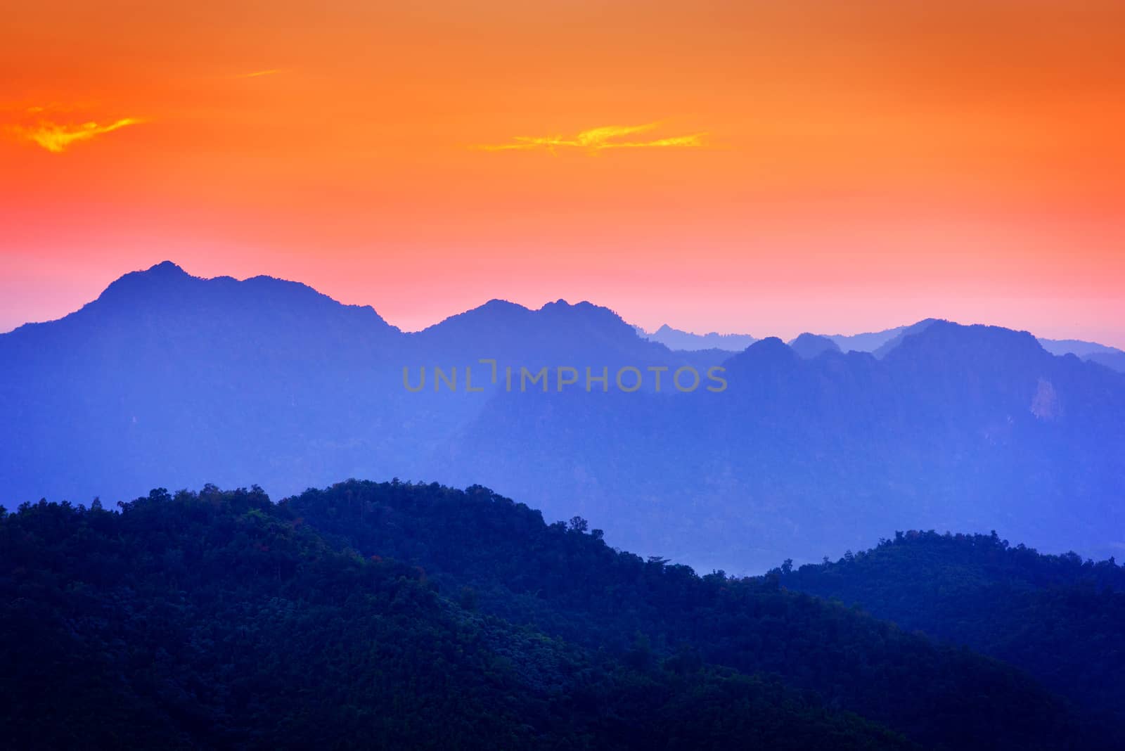 sunset in the mountains in Tak province, Thailand.