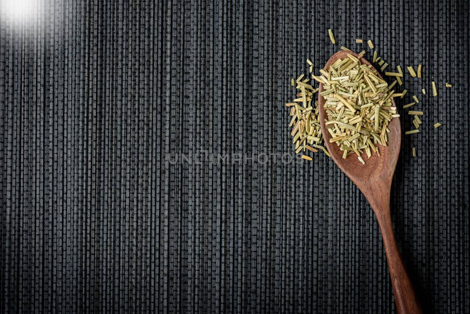 Closeup organic dried rosemary, ingredient for cooking. Herb concept.