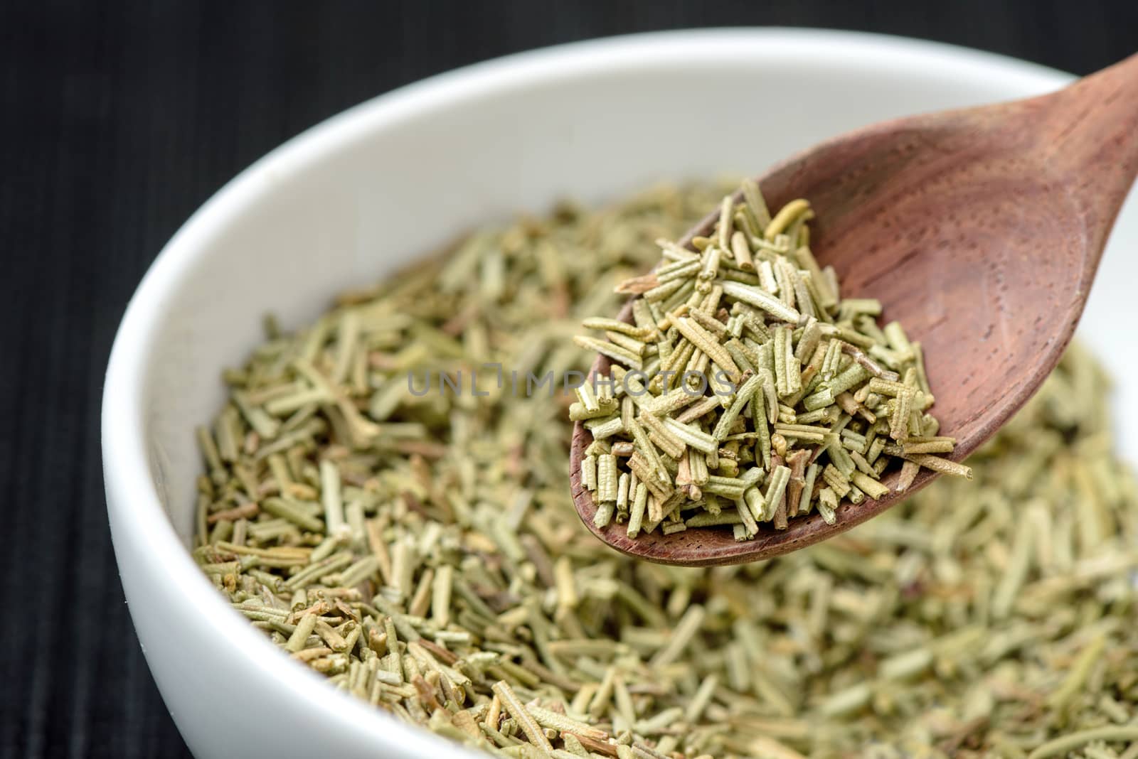 Closeup organic dried rosemary, ingredient for cooking. Herb concept.