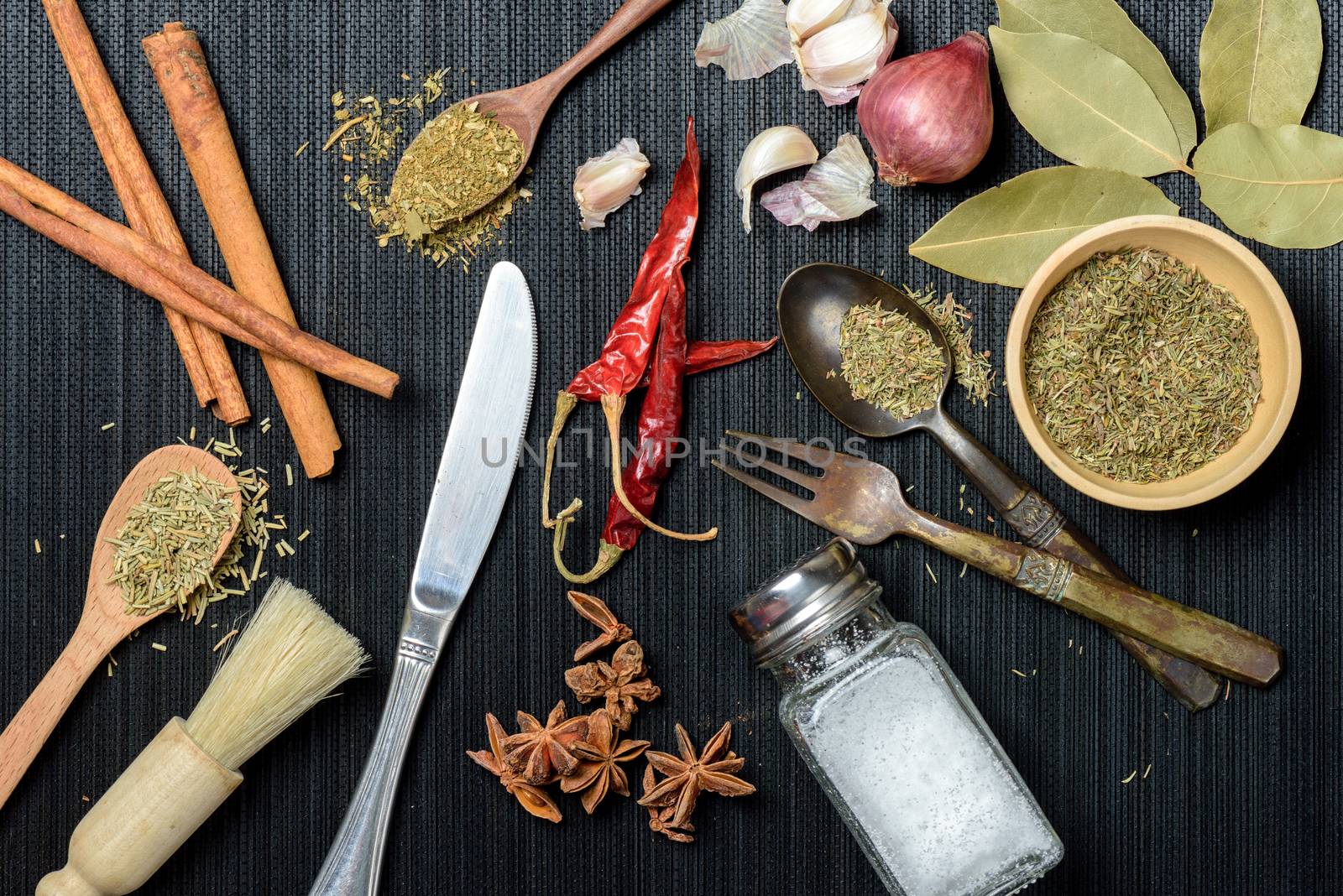 many herbs in the kitchen. herbs for cooking.