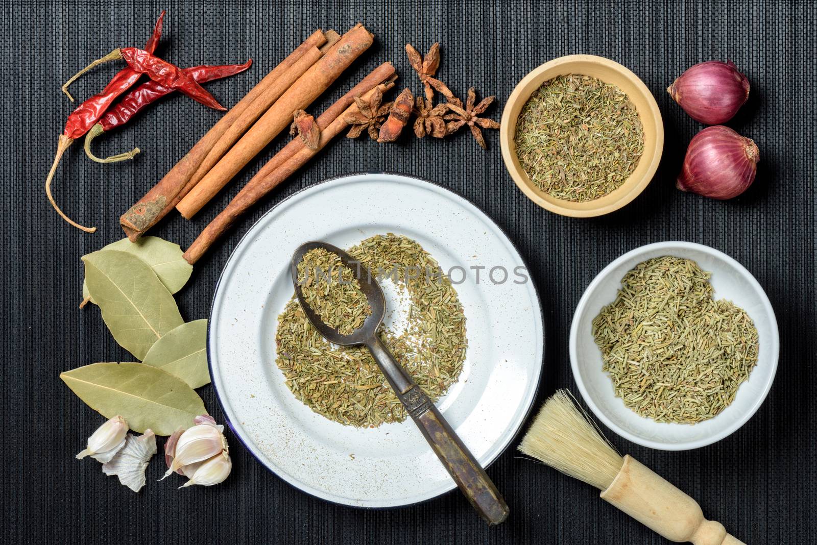 many herbs in the kitchen. herbs for cooking.