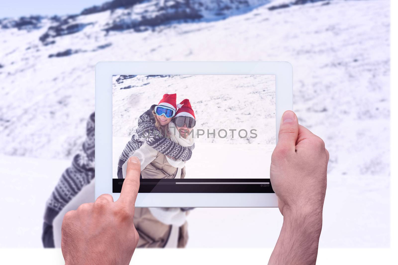 Composite image of hand holding tablet pc by Wavebreakmedia