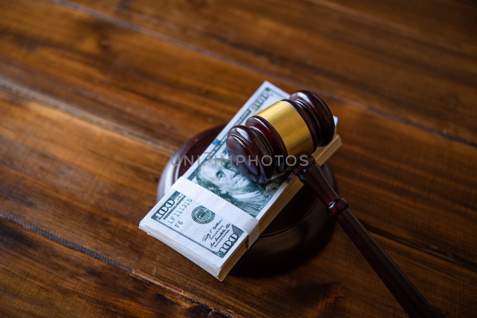 Law theme, mallet of the judge, law enforcement officers, evidence-based cases, and documents taken into account.