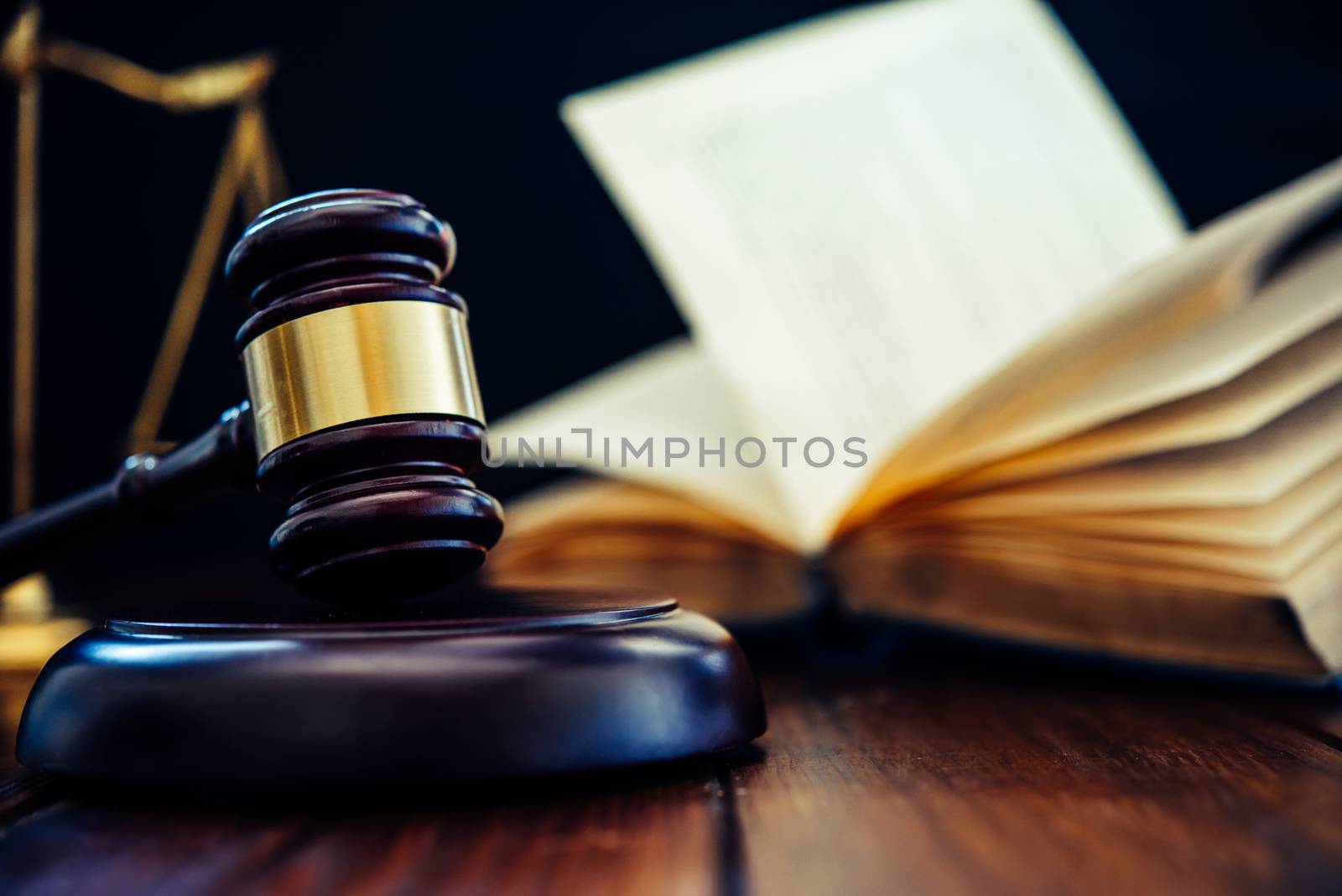 Law theme, mallet of the judge, law enforcement officers, evidence-based cases, and documents taken into account.