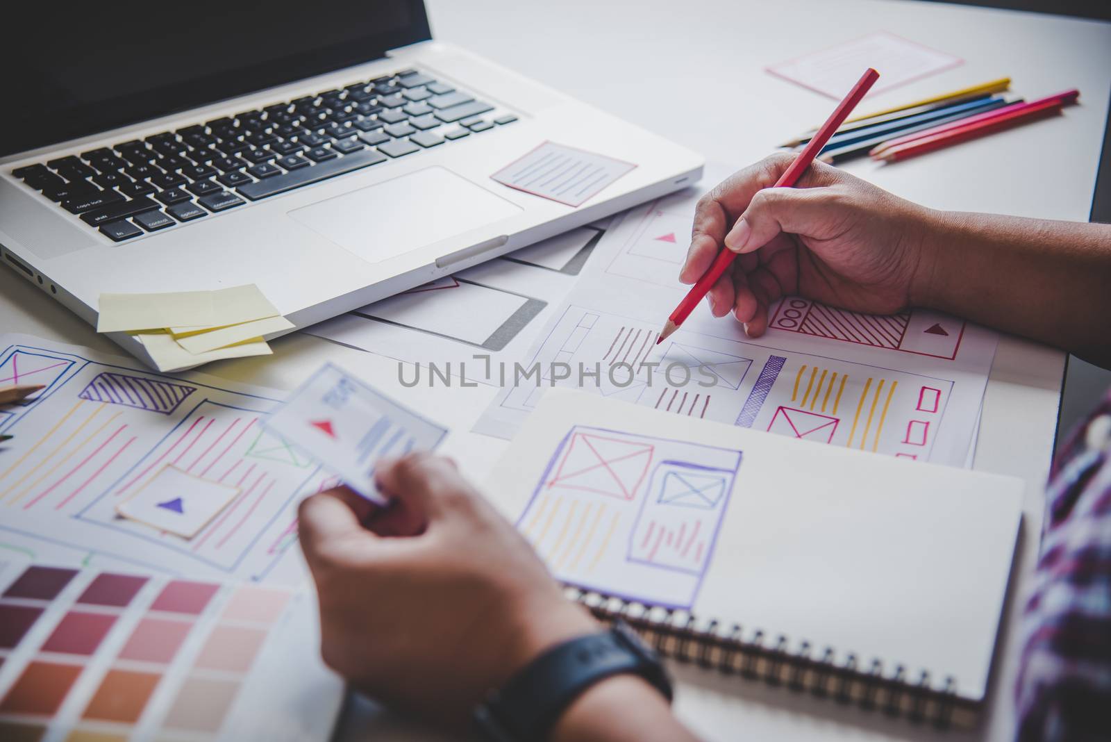 designer graphic creative ,creativity woman  working on laptop and designing  coloring color ideas style