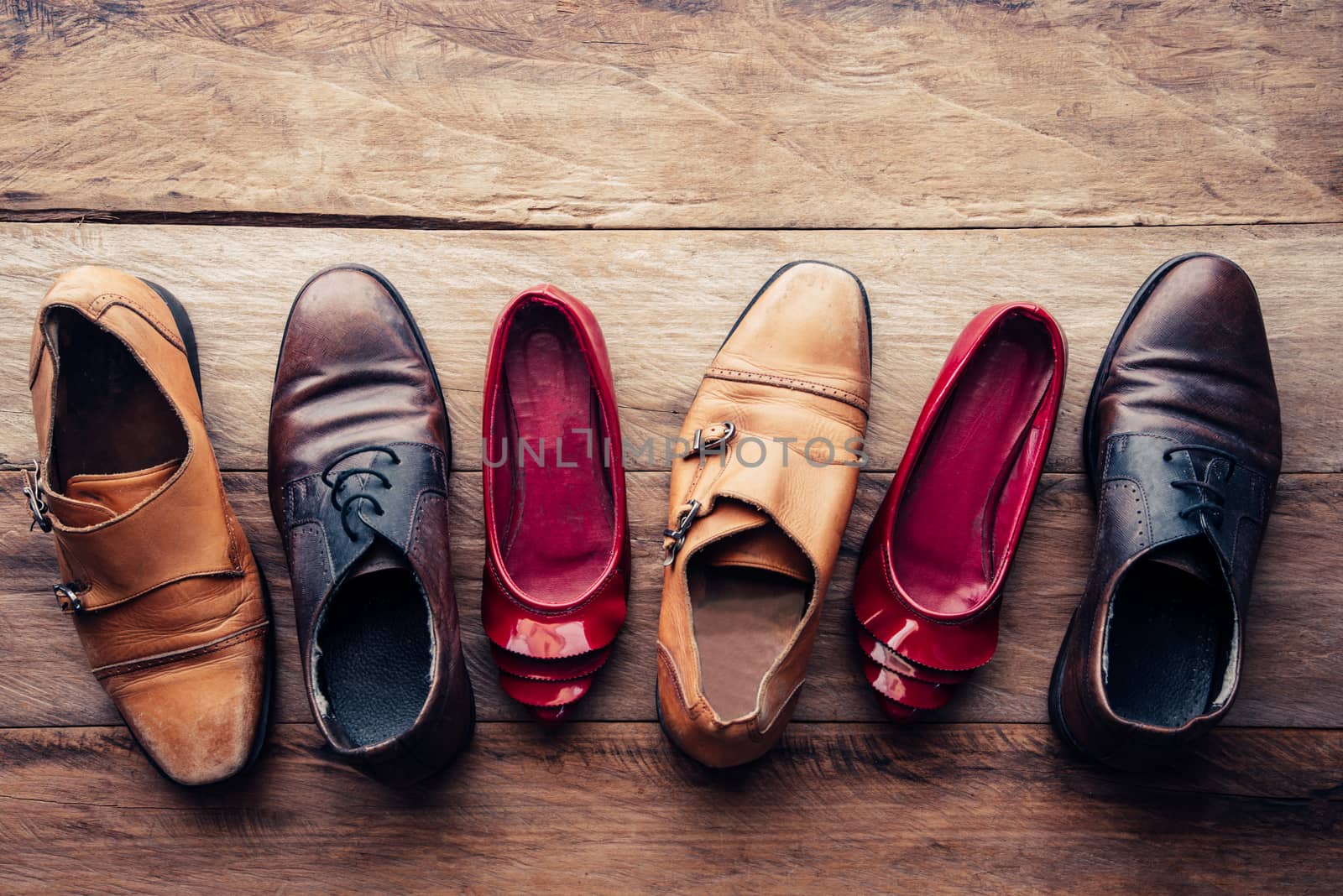shoes various styles  on a wooden floor - lifestyles.