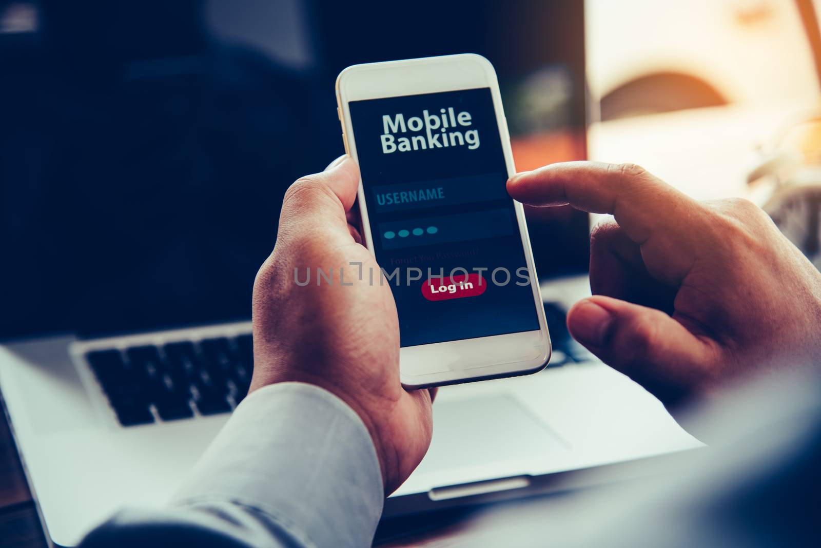 hands using mobile banking on smart phone 