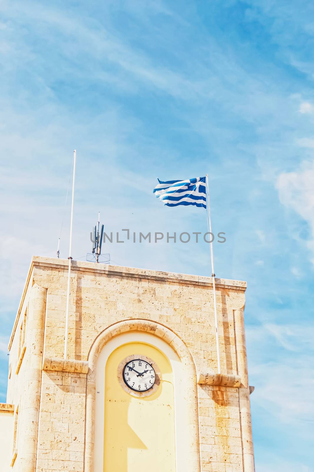 Greek flag and blue sky, travel and politics by Anneleven