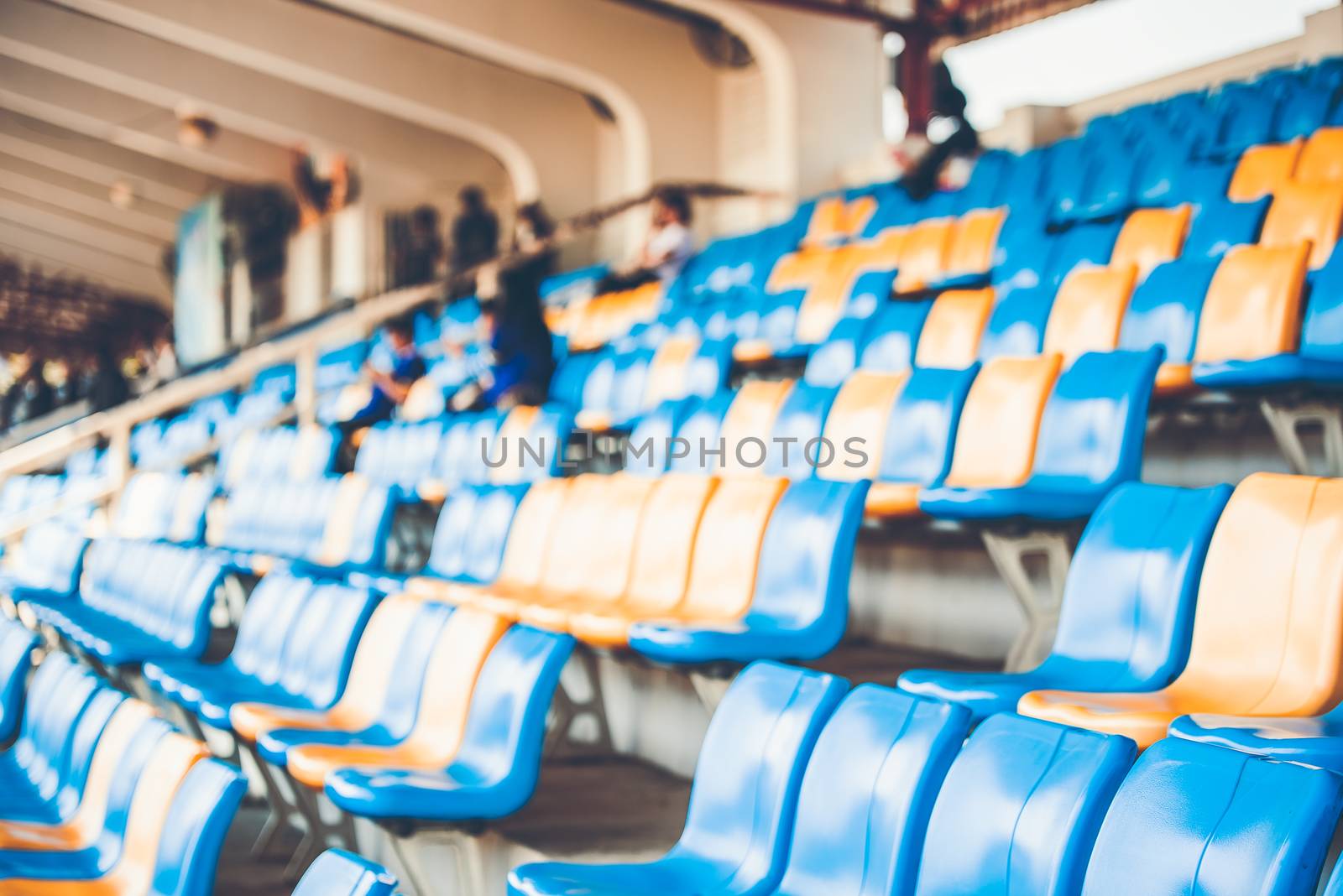 Rows of plastic seats on a grandstand, chair in a stadium, sitting area for spectator