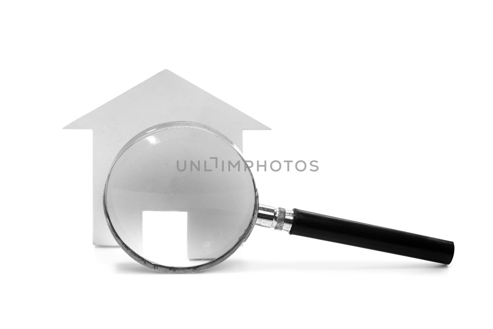 magnifying glass with house symbol on white by winnond