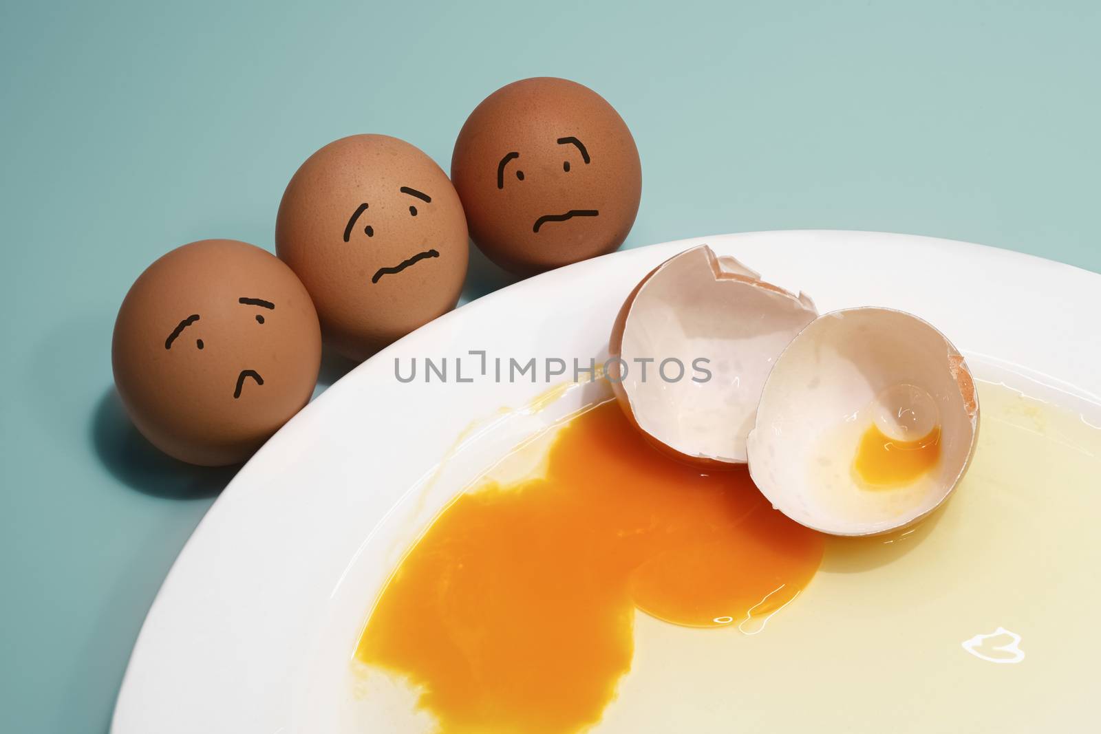 afraid emotions of eggs group and broken egg on white plate