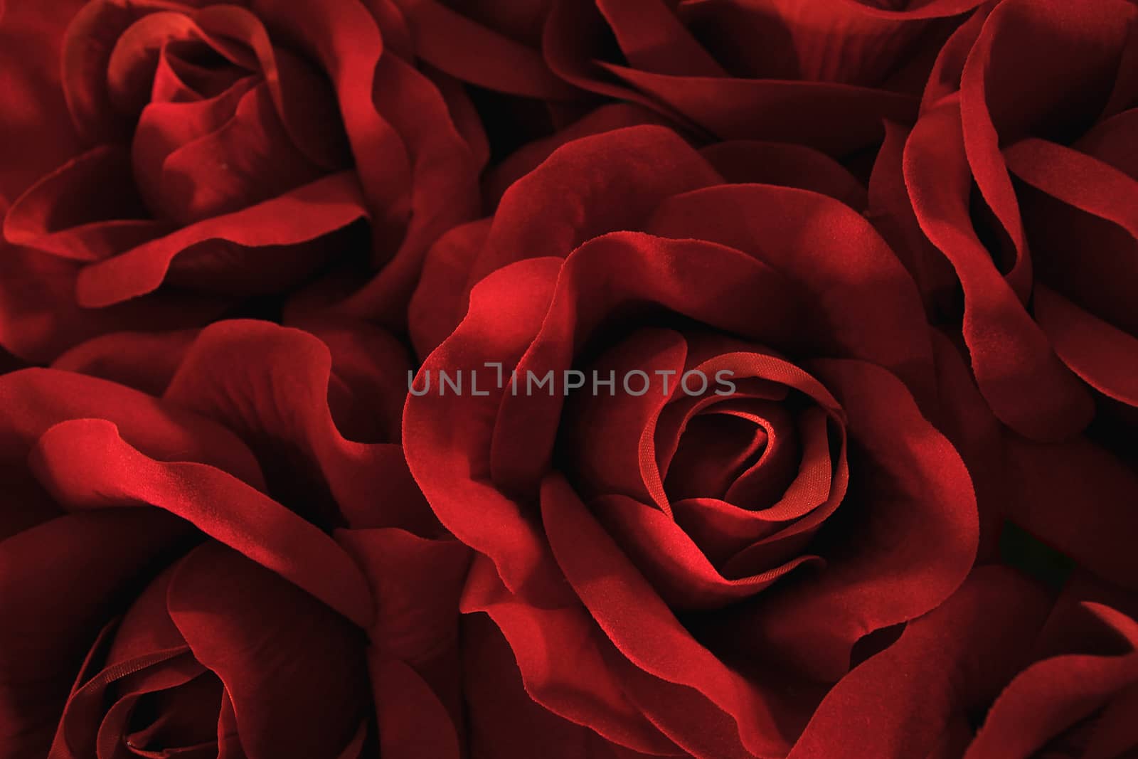 red bouquet artificial roses background