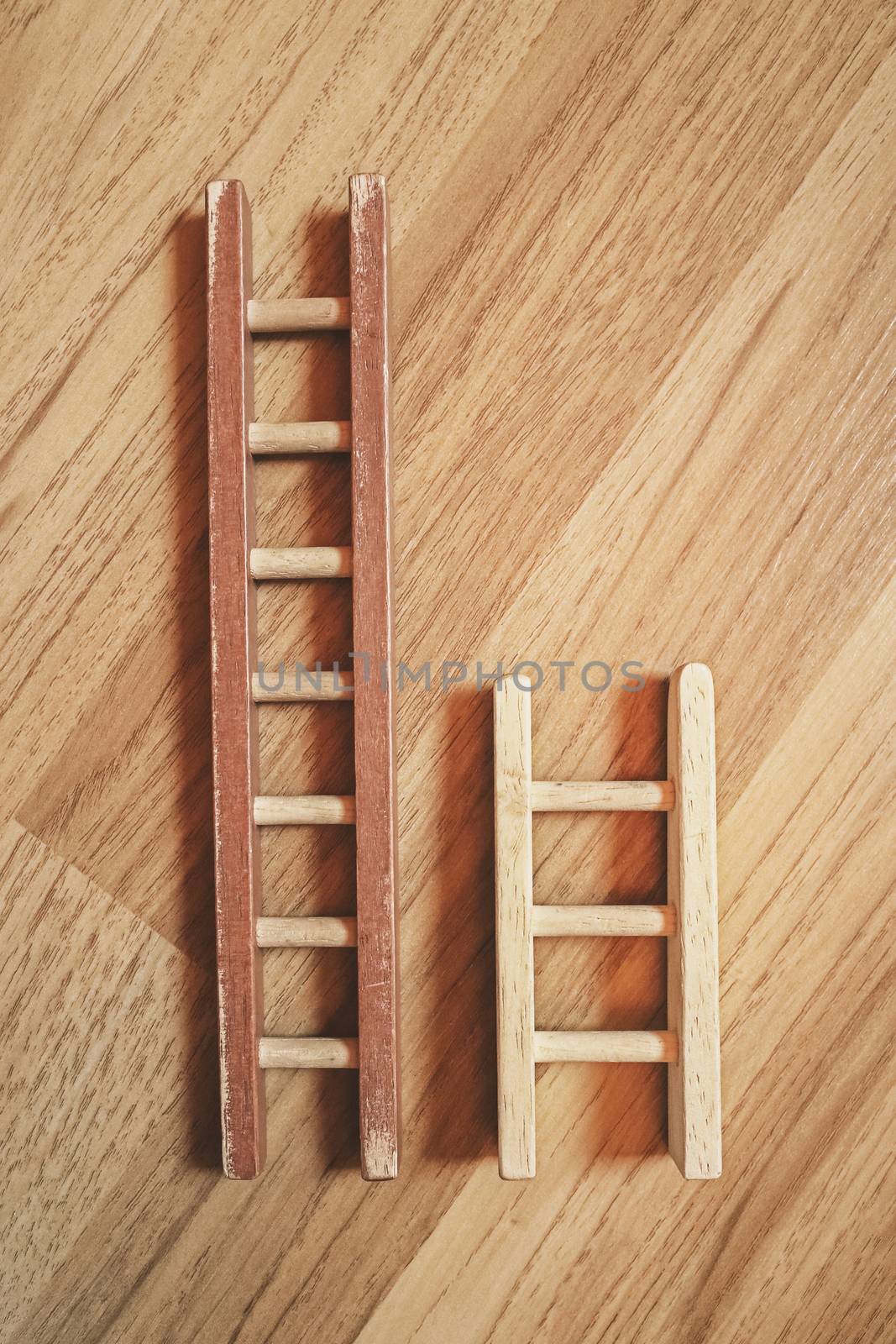 short and long wooden ladder