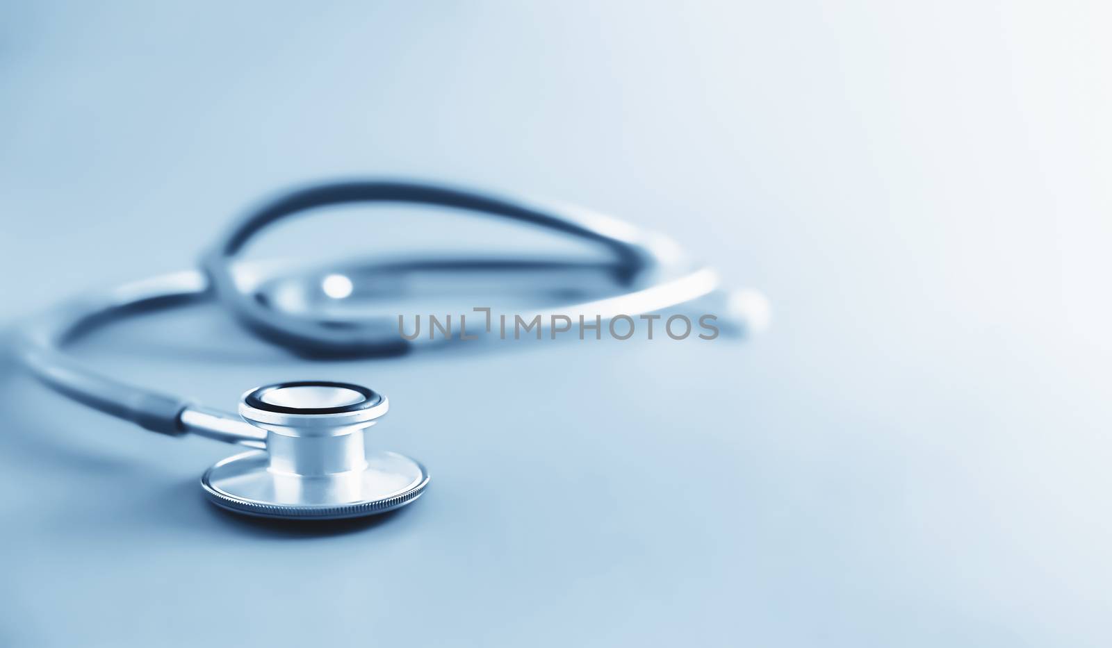 stethoscope blue tone background with copyspace
