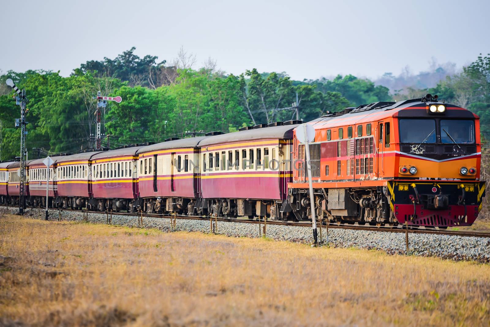 Old Thai-style trains that can still pick-up passengers on the t by photobyphotoboy
