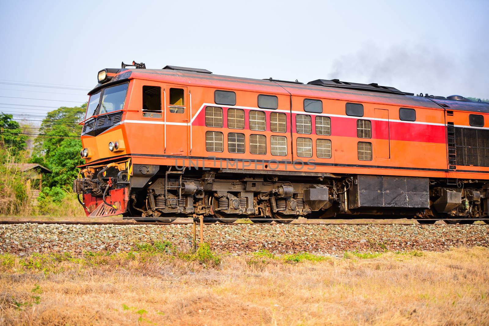 Old Thai-style trains that can still pick-up passengers on the t by photobyphotoboy