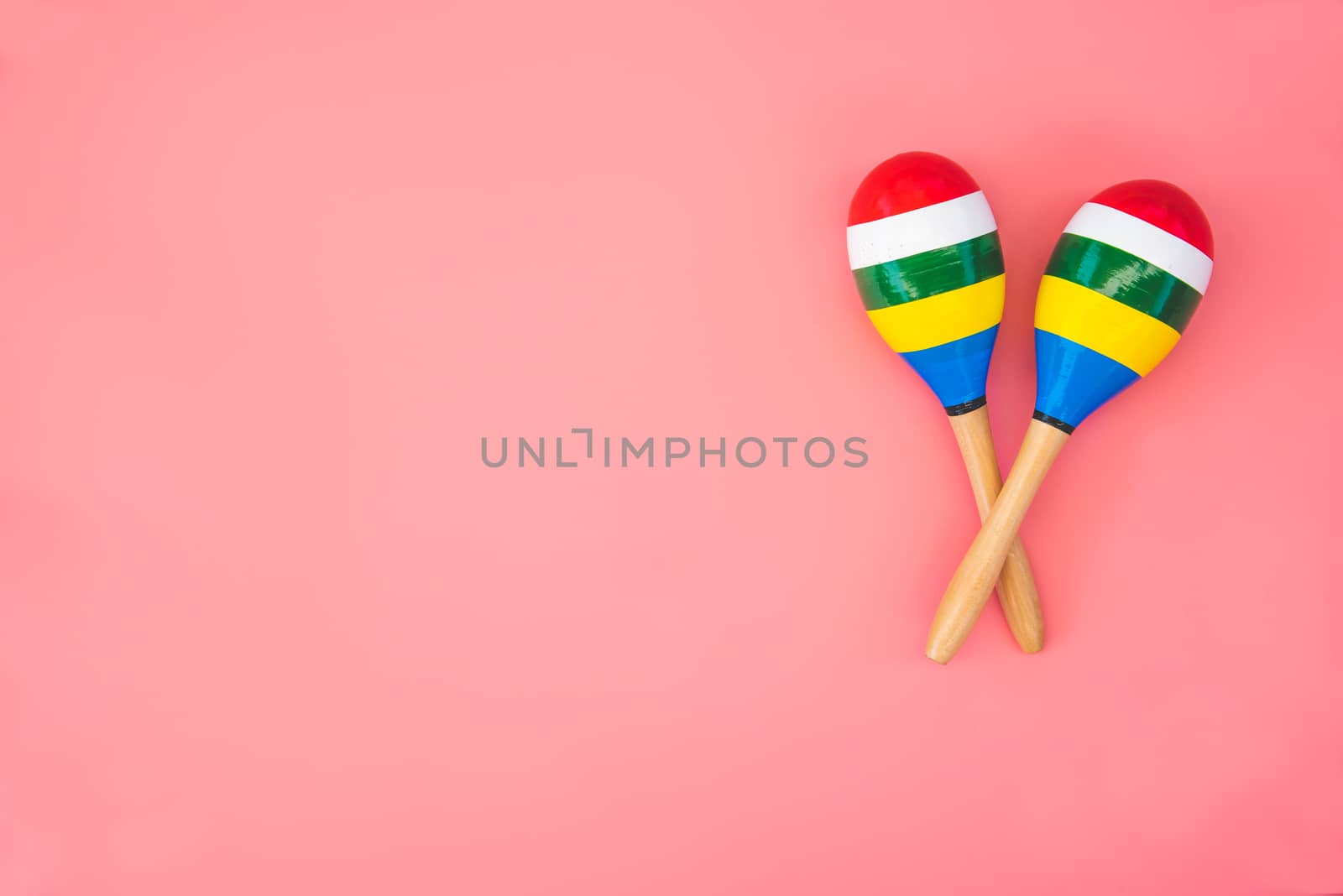 Top view for maracas beautiful color on pink background. by photobyphotoboy